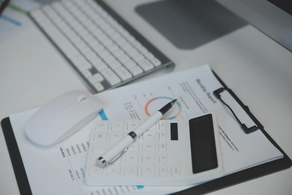 Manual vs digital accounting comparison showing paper records and accounting software